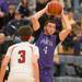 Pioneer's Aedan York looks to pass the ball as he is being graded by Pinckney's Same Black at Chelsea's holiday basketball tournament on Thursday Dec. 27th.
Courtney Sacco I AnnArbor.com 